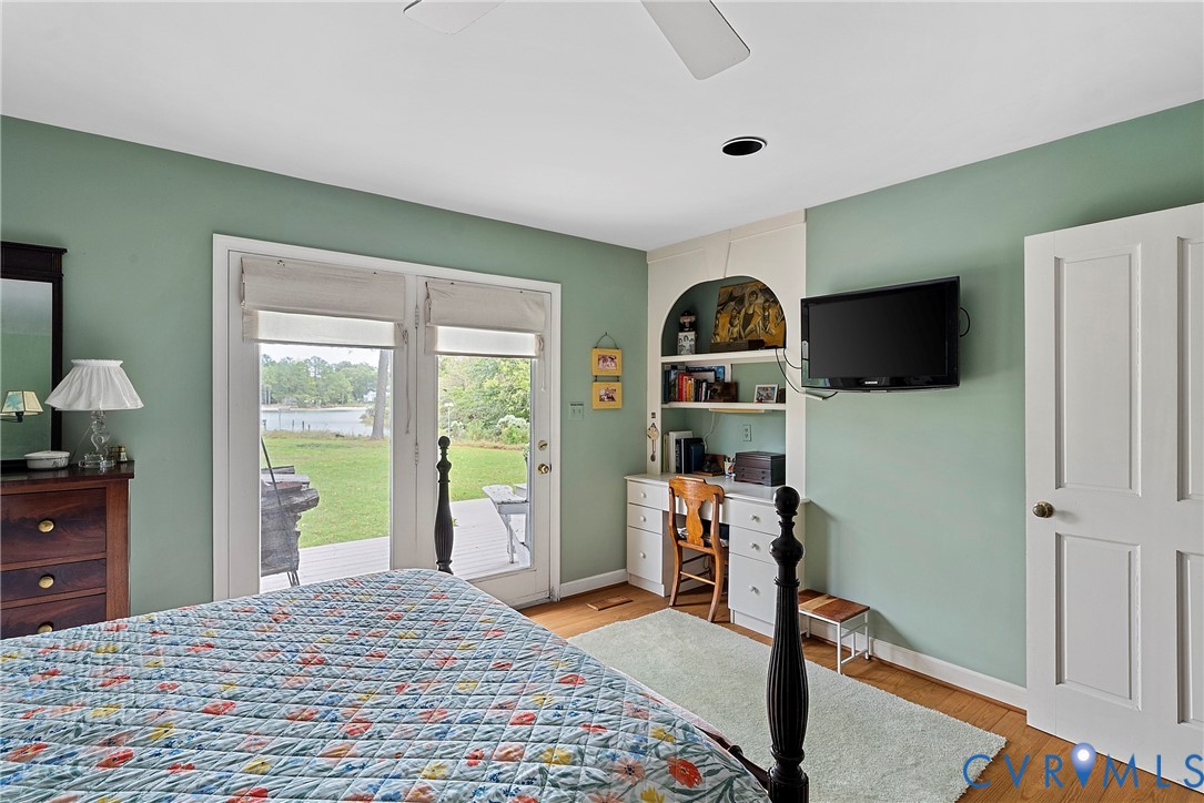 448 McSwain Road White Stone, VA 22578 - Photo 37 of 50 Bedroom with light wood-type flooring, ceiling fan