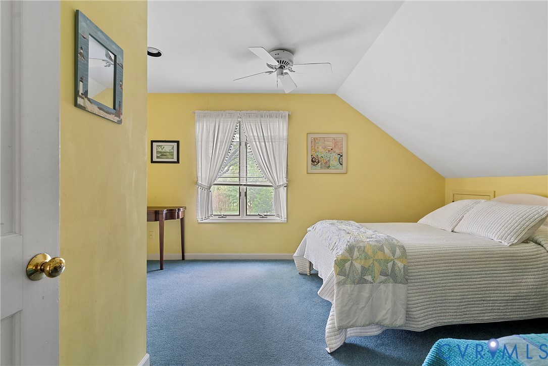 448 McSwain Road White Stone, VA 22578 - Photo 40 of 50 Carpeted bedroom featuring lofted ceiling and a ce