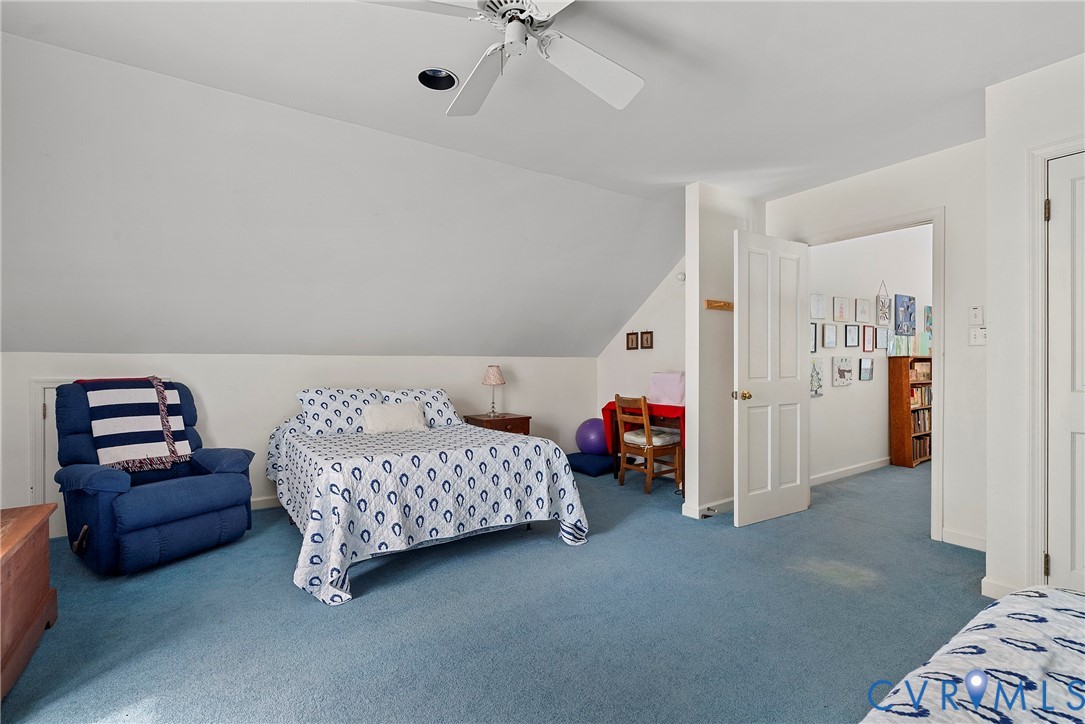 448 McSwain Road White Stone, VA 22578 - Photo 45 of 50 Carpeted bedroom with lofted ceiling and ceiling f