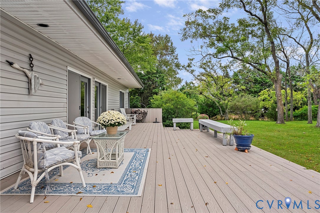 448 McSwain Road White Stone, VA 22578 - Photo 46 of 50 Deck featuring view of scattered trees and a yard
