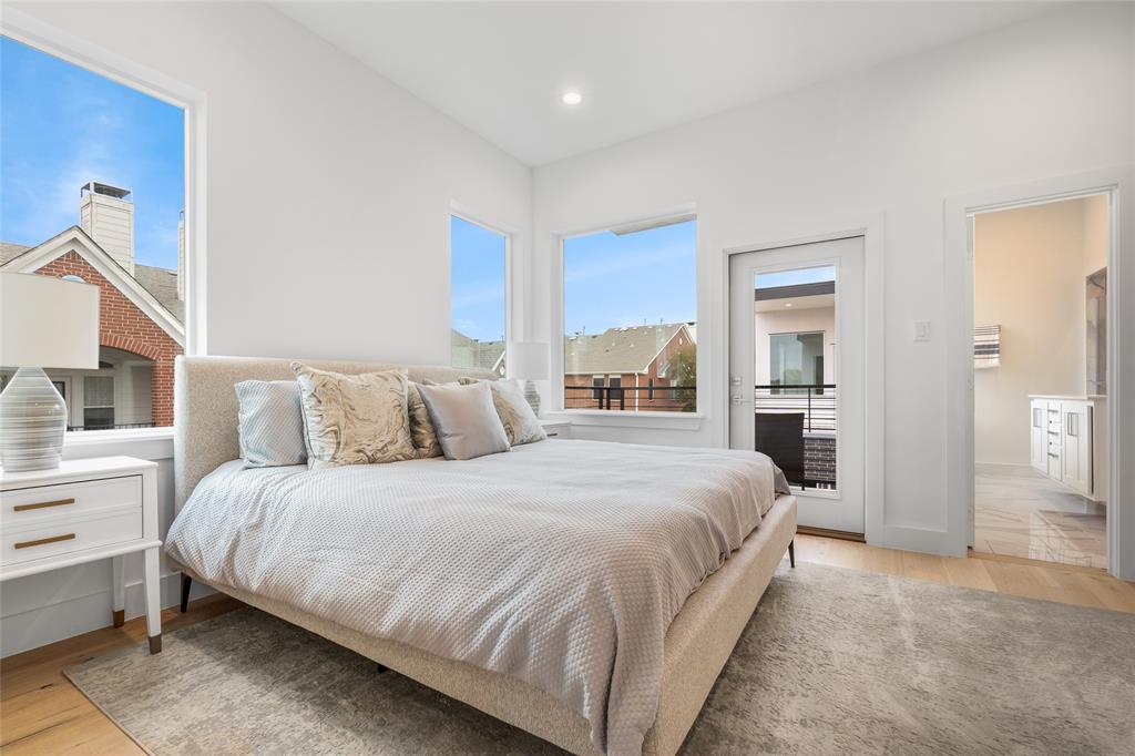 3915 North Hall Street, Unit 202 Dallas, TX 75219 - Photo 11 of 18 a bedroom with a bed and a view of bedroom