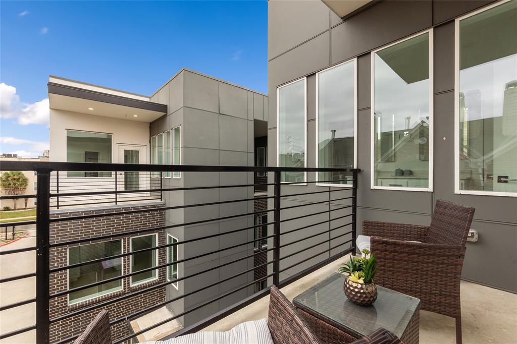 3915 North Hall Street, Unit 202 Dallas, TX 75219 - Photo 15 of 18 a view of kitchen with wooden floor