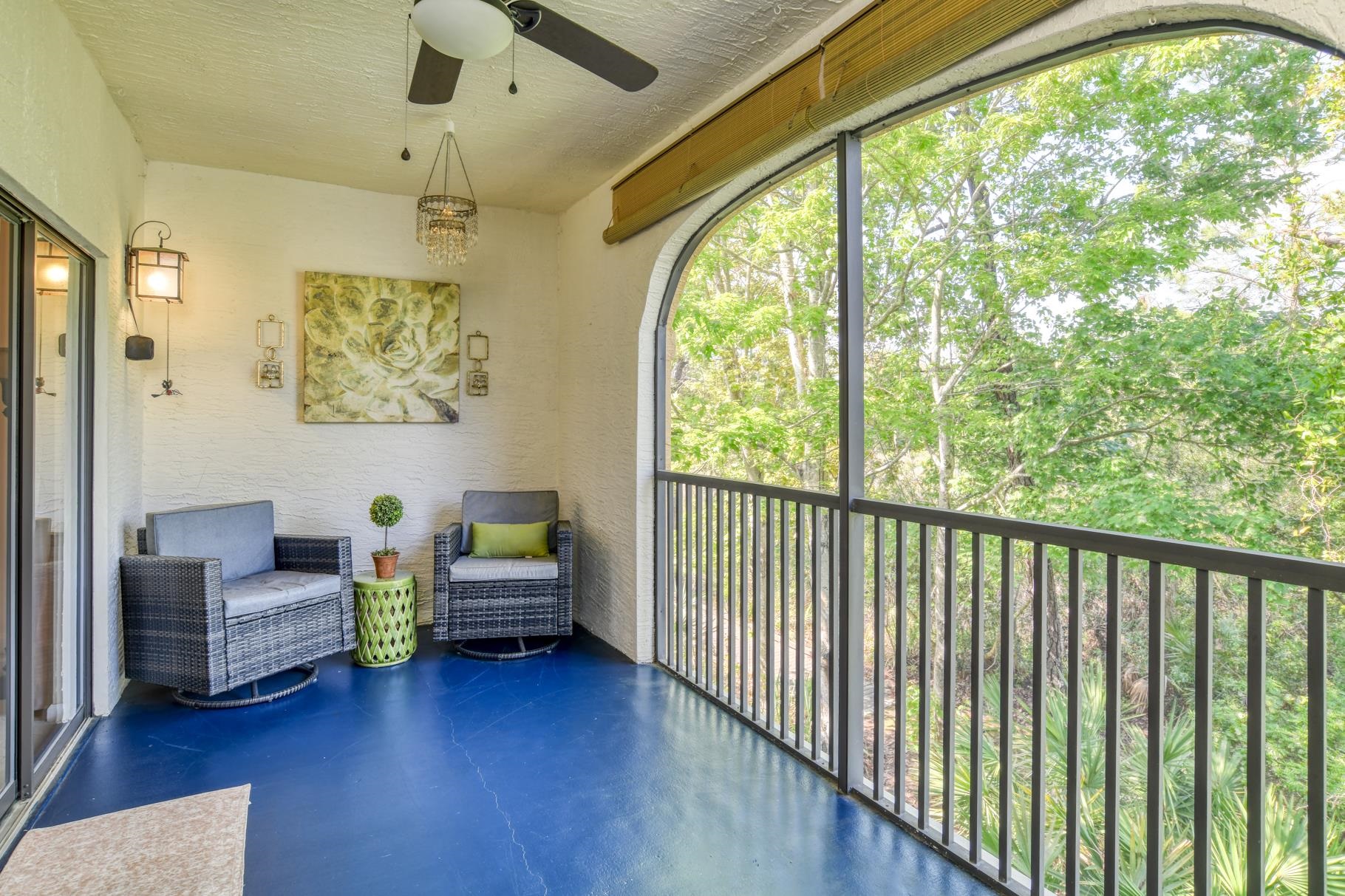 1825 Vista Cove Road St. Augustine, FL 32084 - Photo 12 of 66 a bedroom with furniture and wooden floor