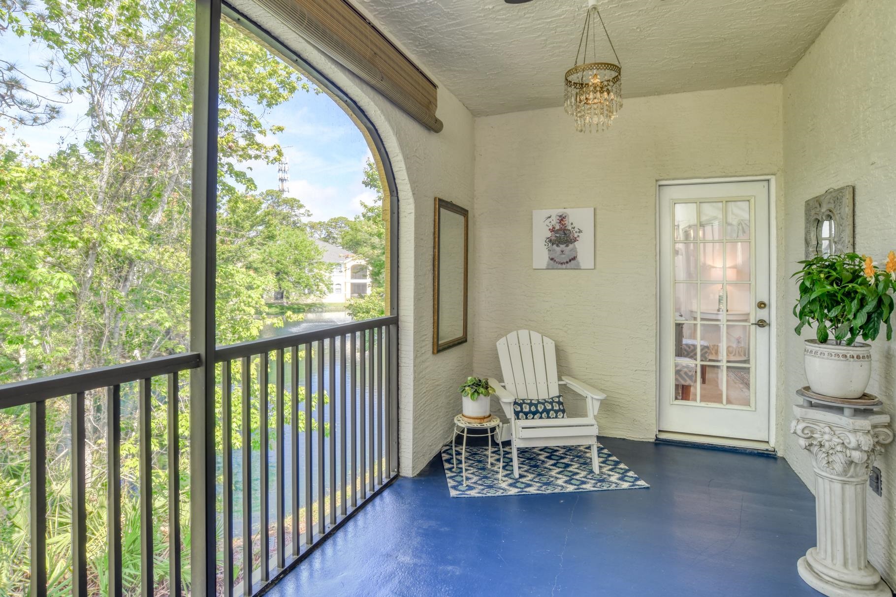 1825 Vista Cove Road St. Augustine, FL 32084 - Photo 14 of 66 a living room with furniture and a table