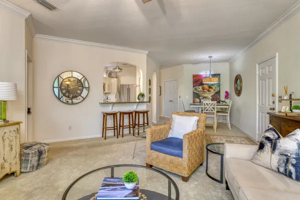 a living room with furniture and a table