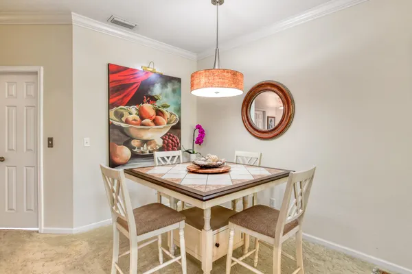 a bathroom with a sink mirror and vanity