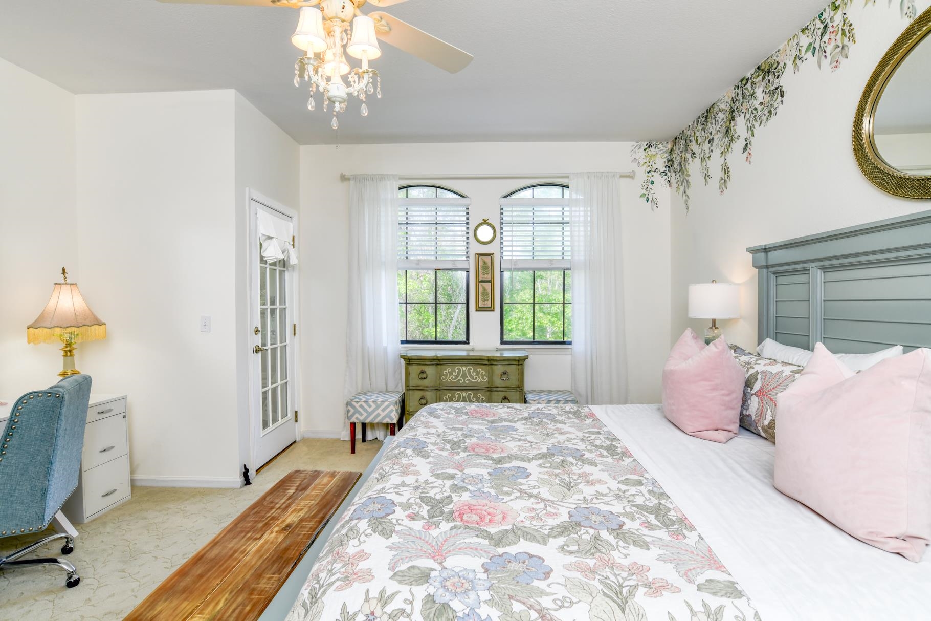 1825 Vista Cove Road St. Augustine, FL 32084 - Photo 26 of 66 a bedroom with a bed window and a chandelier