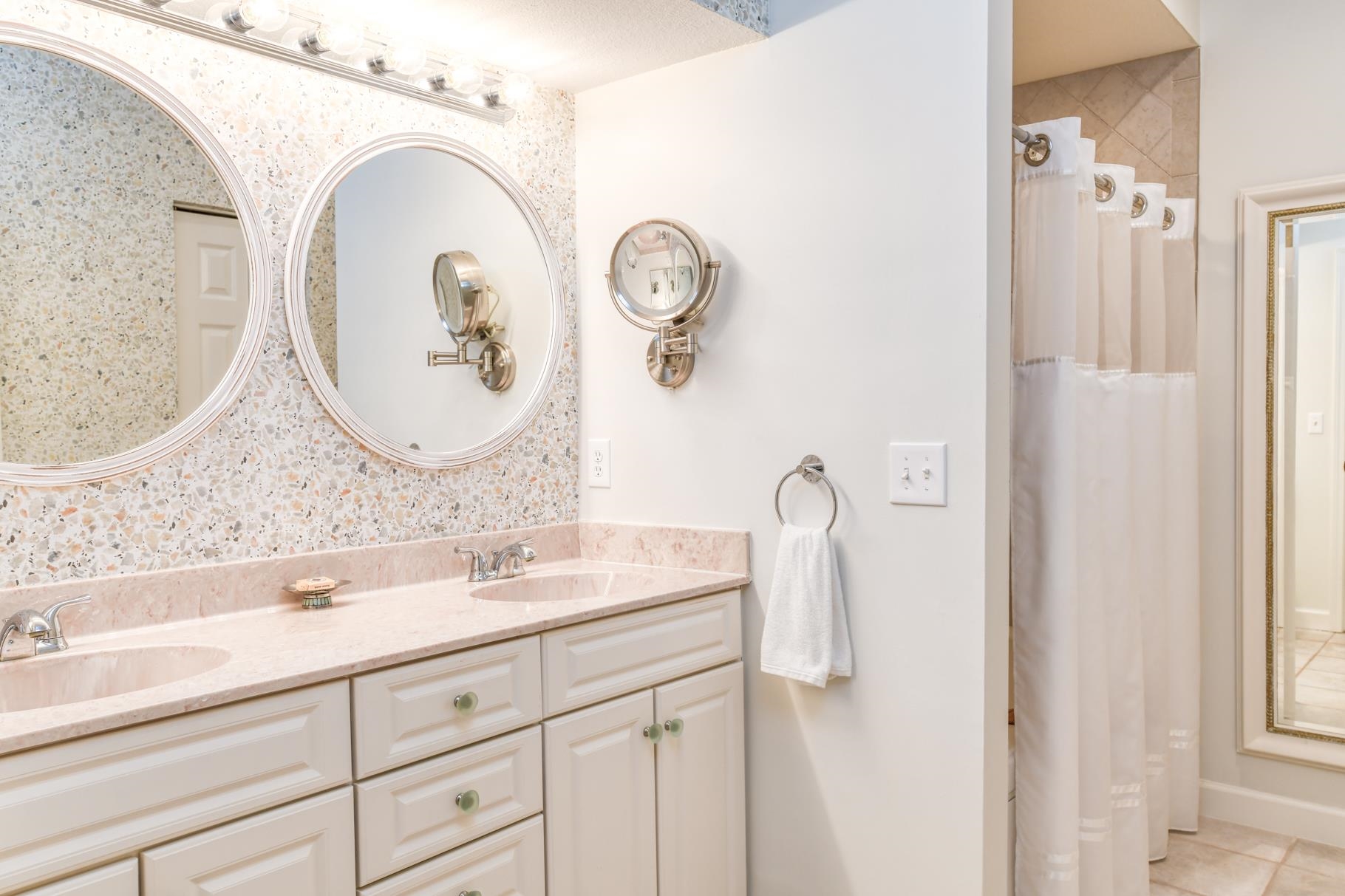 1825 Vista Cove Road St. Augustine, FL 32084 - Photo 27 of 66 a bathroom with a sink mirror and vanity