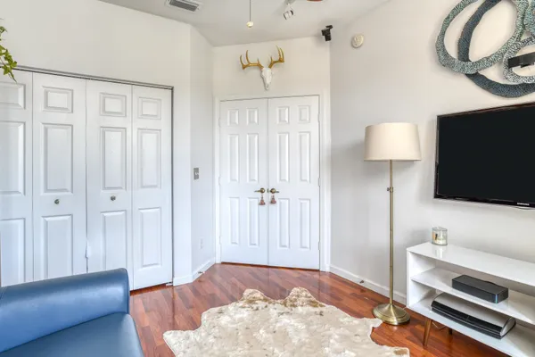 a view of a swimming pool with a yard