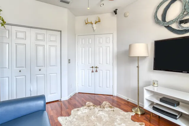 a view of a swimming pool with a yard