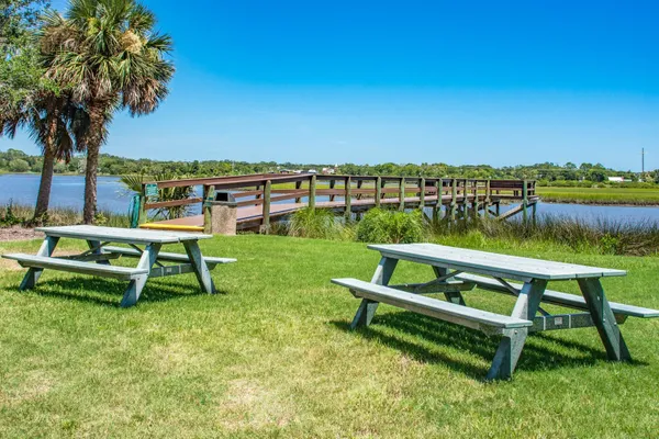 a view of a livingroom with furniture and window