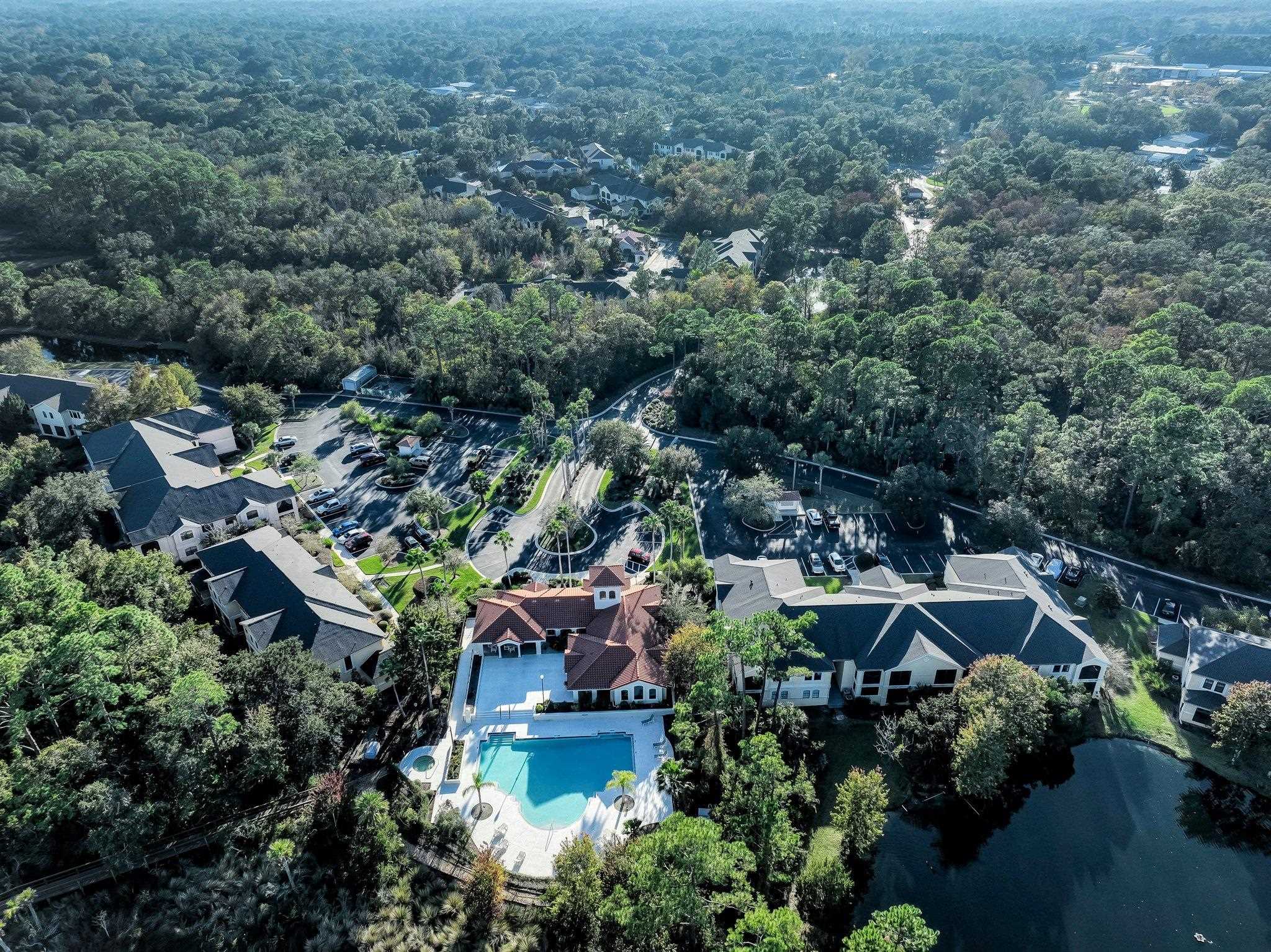 1825 Vista Cove Road St. Augustine, FL 32084 - Photo 56 of 66 an aerial view of residential house with outdoor space and trees all around