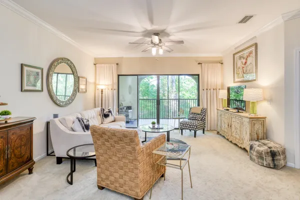 a view of a balcony with wooden floor
