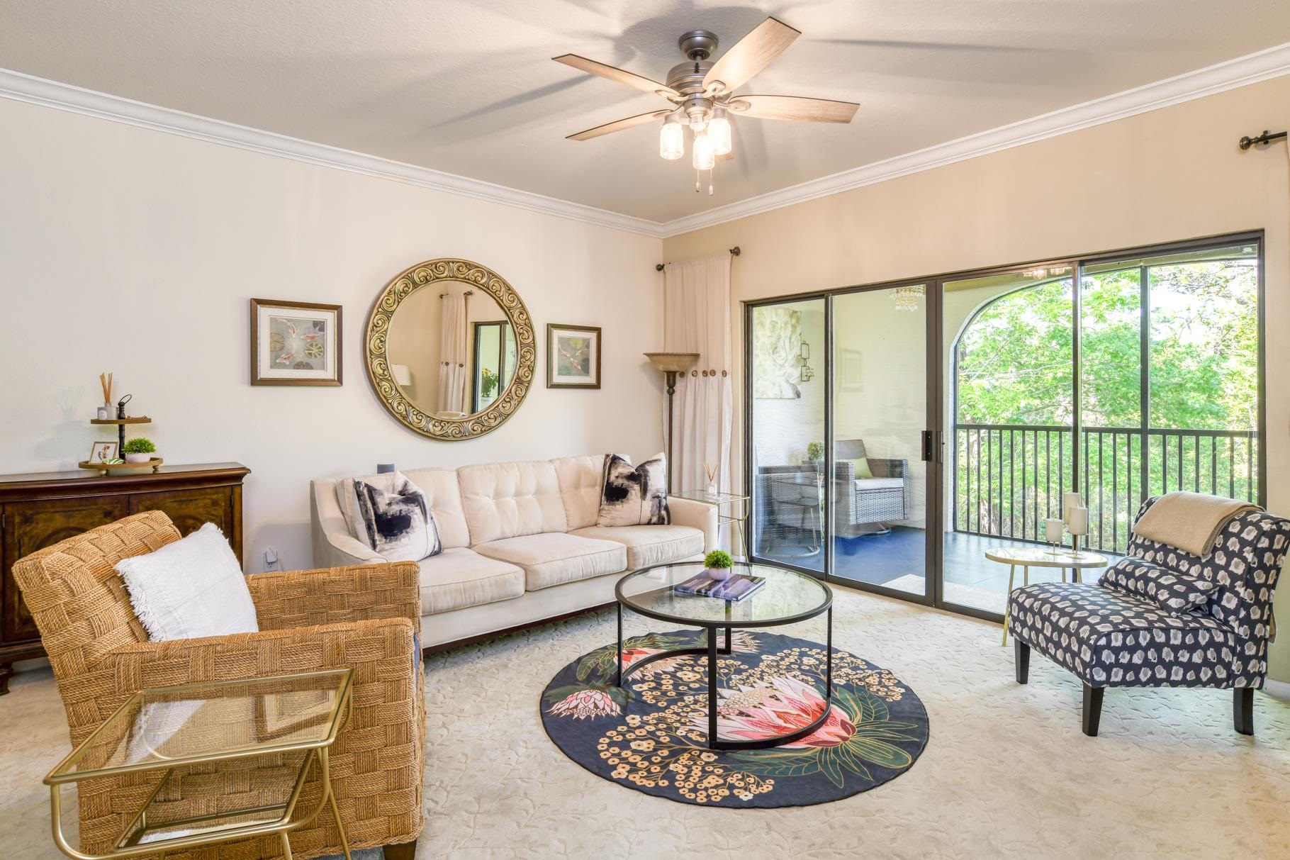 1825 Vista Cove Road St. Augustine, FL 32084 - Photo 9 of 66 a living room with furniture a rug a large window and a chandelier