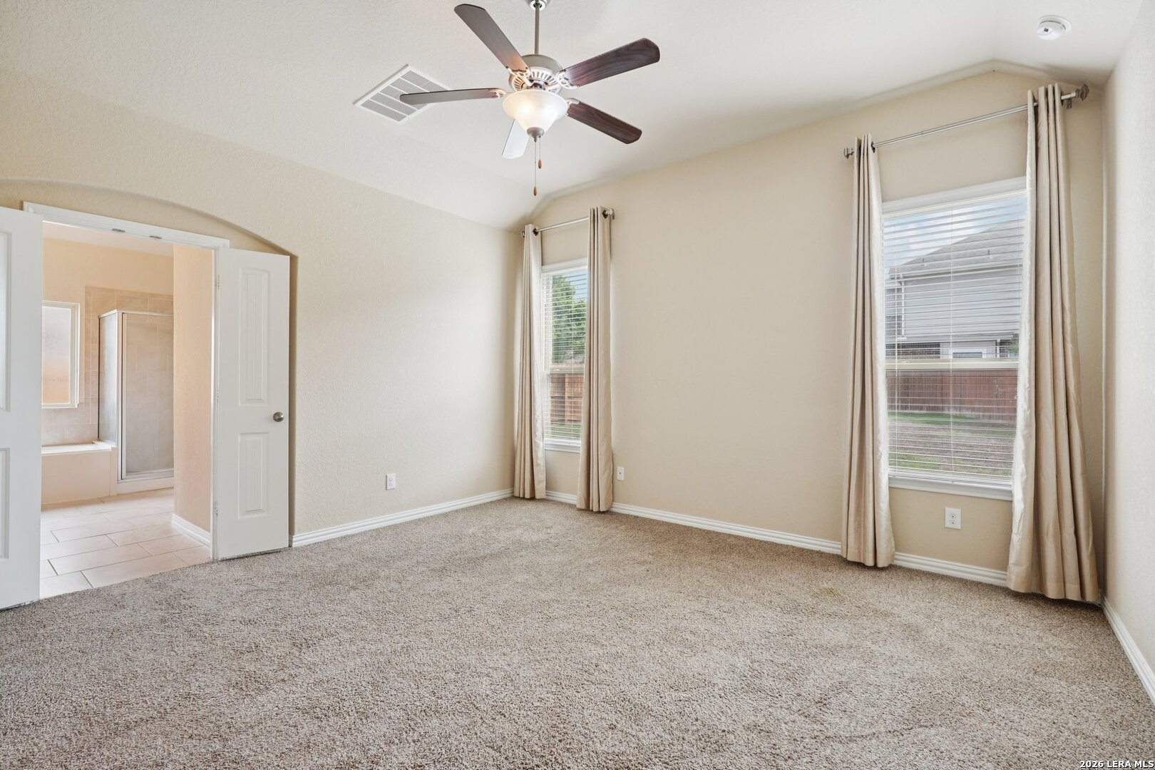 8722 Study Butte San Antonio, TX 78254 - Photo 20 of 40 an empty room with fan and entrance