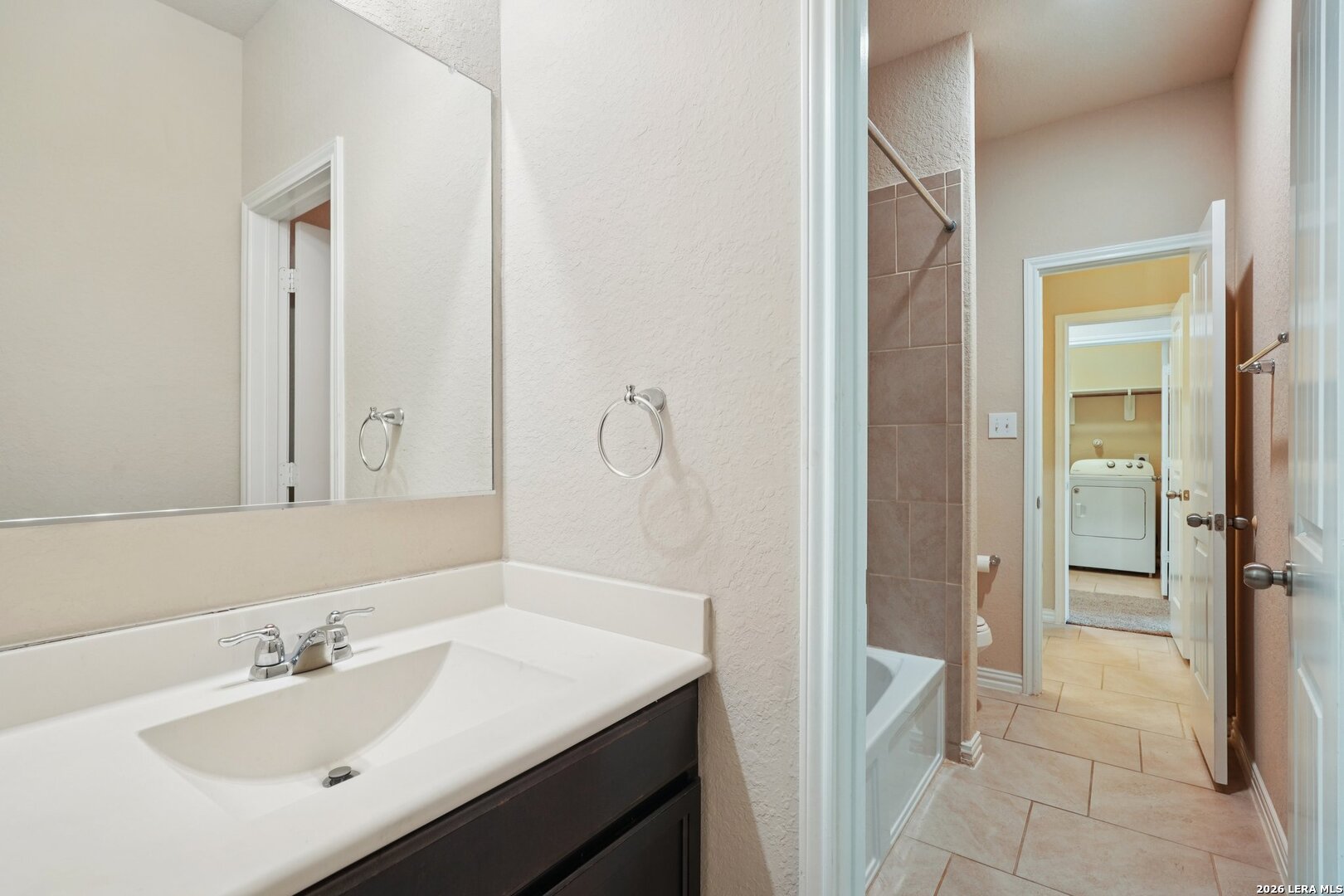 8722 Study Butte San Antonio, TX 78254 - Photo 28 of 40 a bathroom with a sink and a mirror
