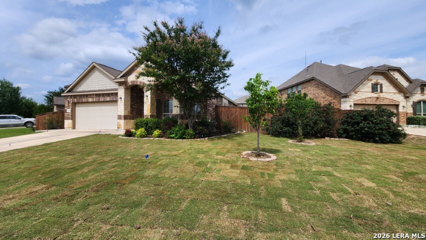 8722 Study Butte San Antonio, TX 78254 - Photo 3 of 40 a house with trees in the background