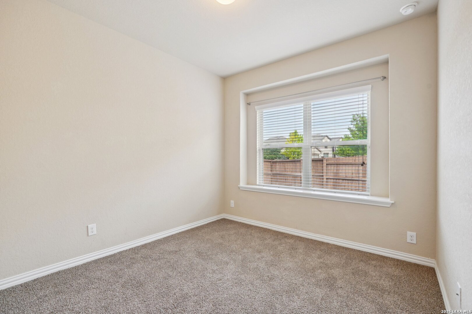 8722 Study Butte San Antonio, TX 78254 - Photo 33 of 40 an empty room with a window