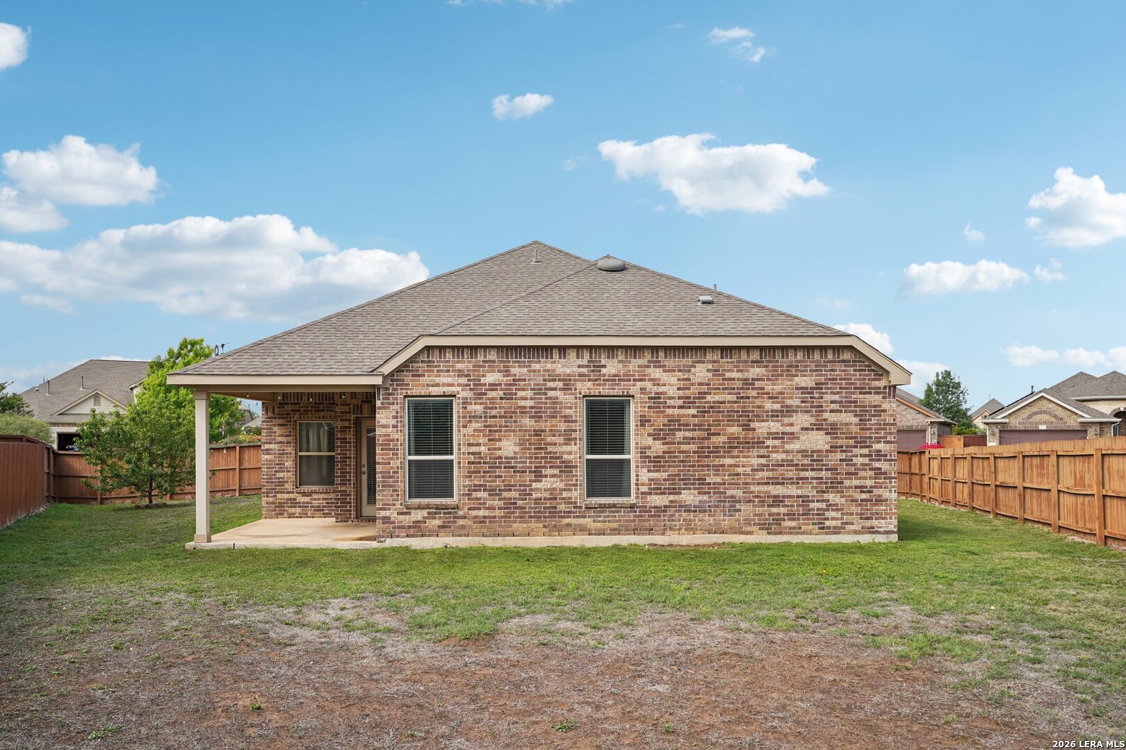 8722 Study Butte San Antonio, TX 78254 - Photo 39 of 40 a front view of a house with garden