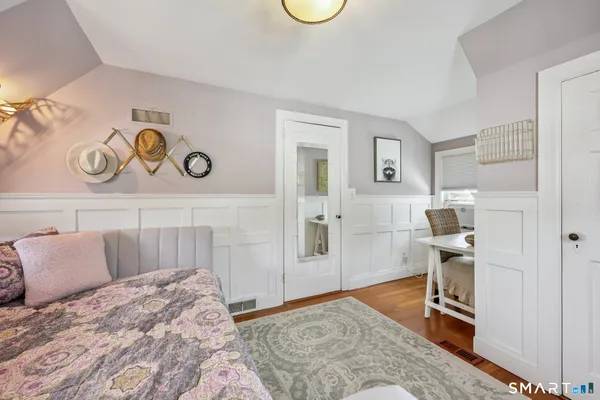 a bedroom with a bed and a cabinets