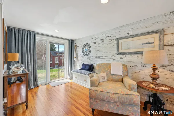 a living room with furniture and a table