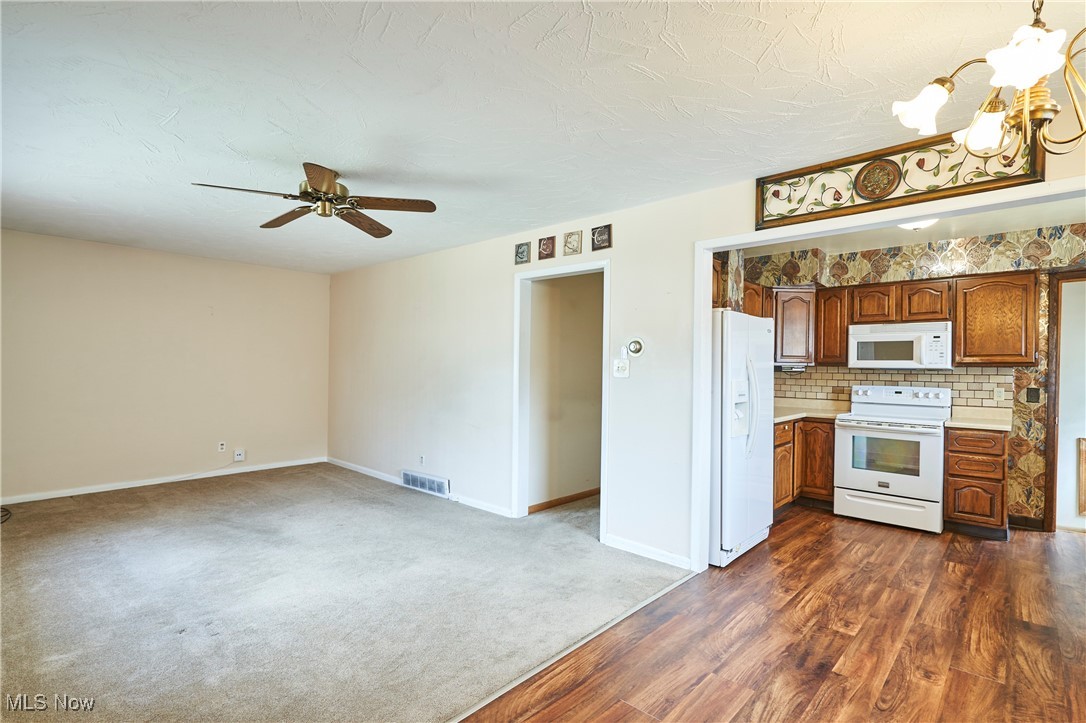 597 Hillman Road Akron, OH 44312 - Photo 8 of 22 Kitchen and Living Room
