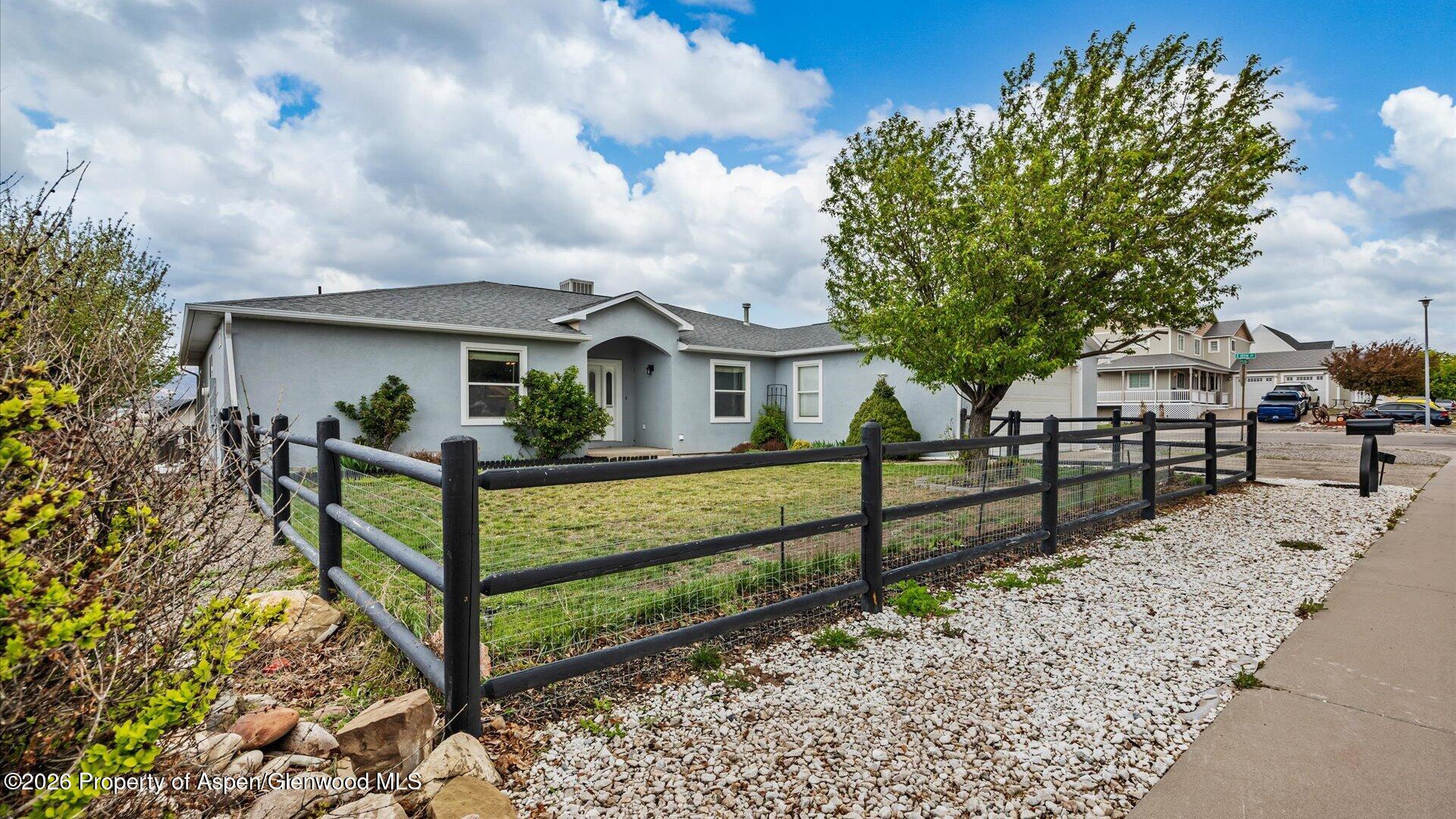 1459 Anvil View Avenue Rifle, CO 81650 - Photo 27 of 29 a view of a house with wooden fence