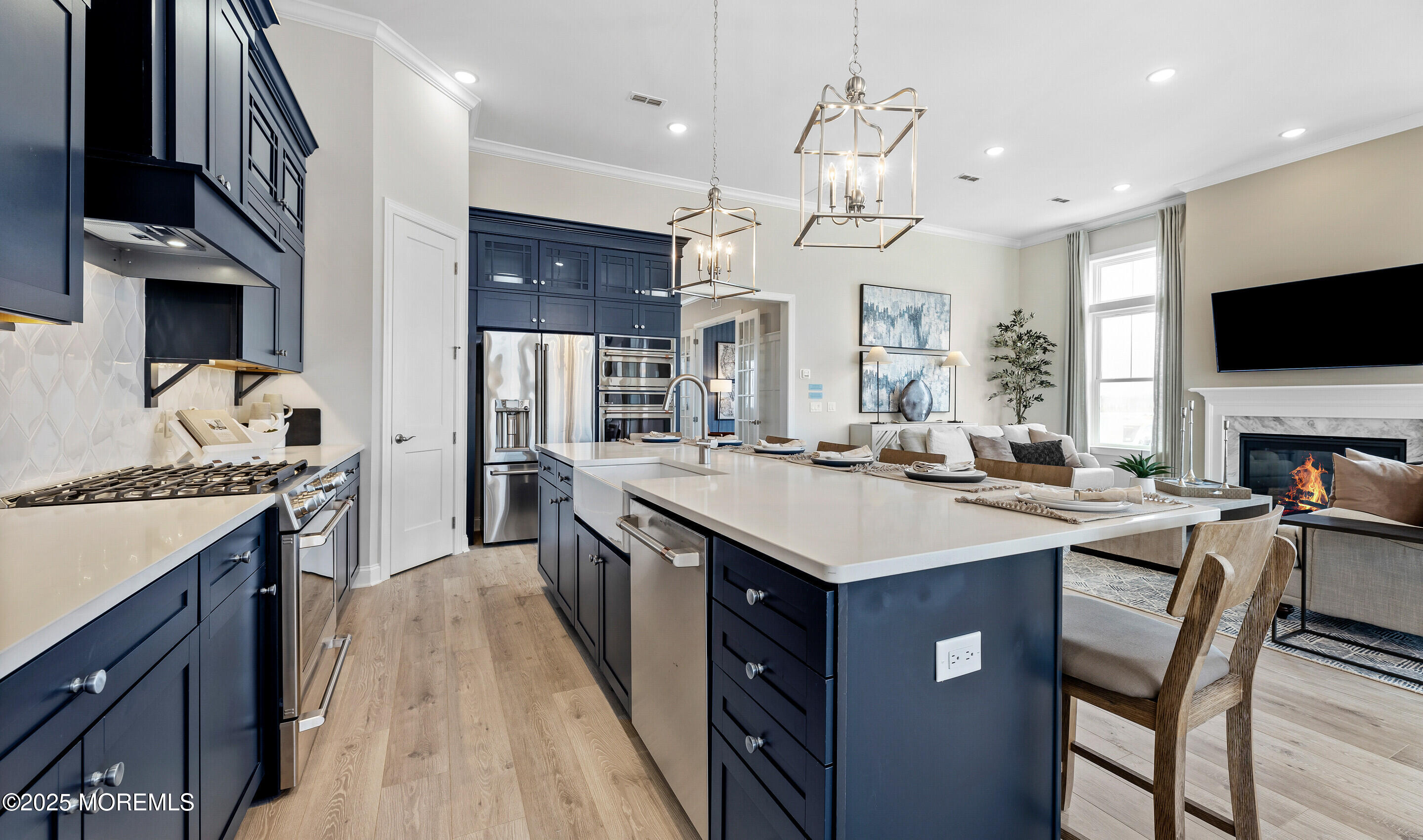 176 Highway 33, Unit KILLARNEY III LOFT Manalapan, NJ 07726 - Photo 11 of 41 a kitchen with cabinets a sink a stove and a refrigerator