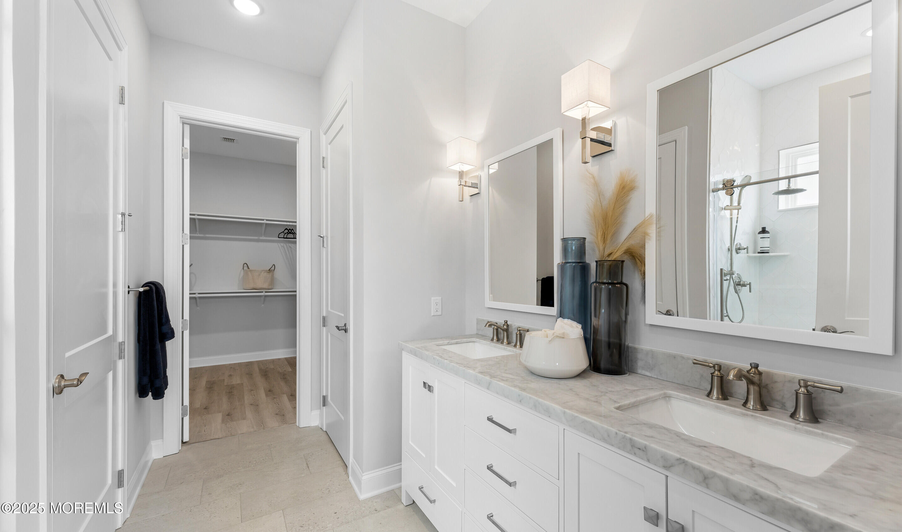 176 Highway 33, Unit KILLARNEY III LOFT Manalapan, NJ 07726 - Photo 16 of 41 a bathroom with double vanity sink and two mirror