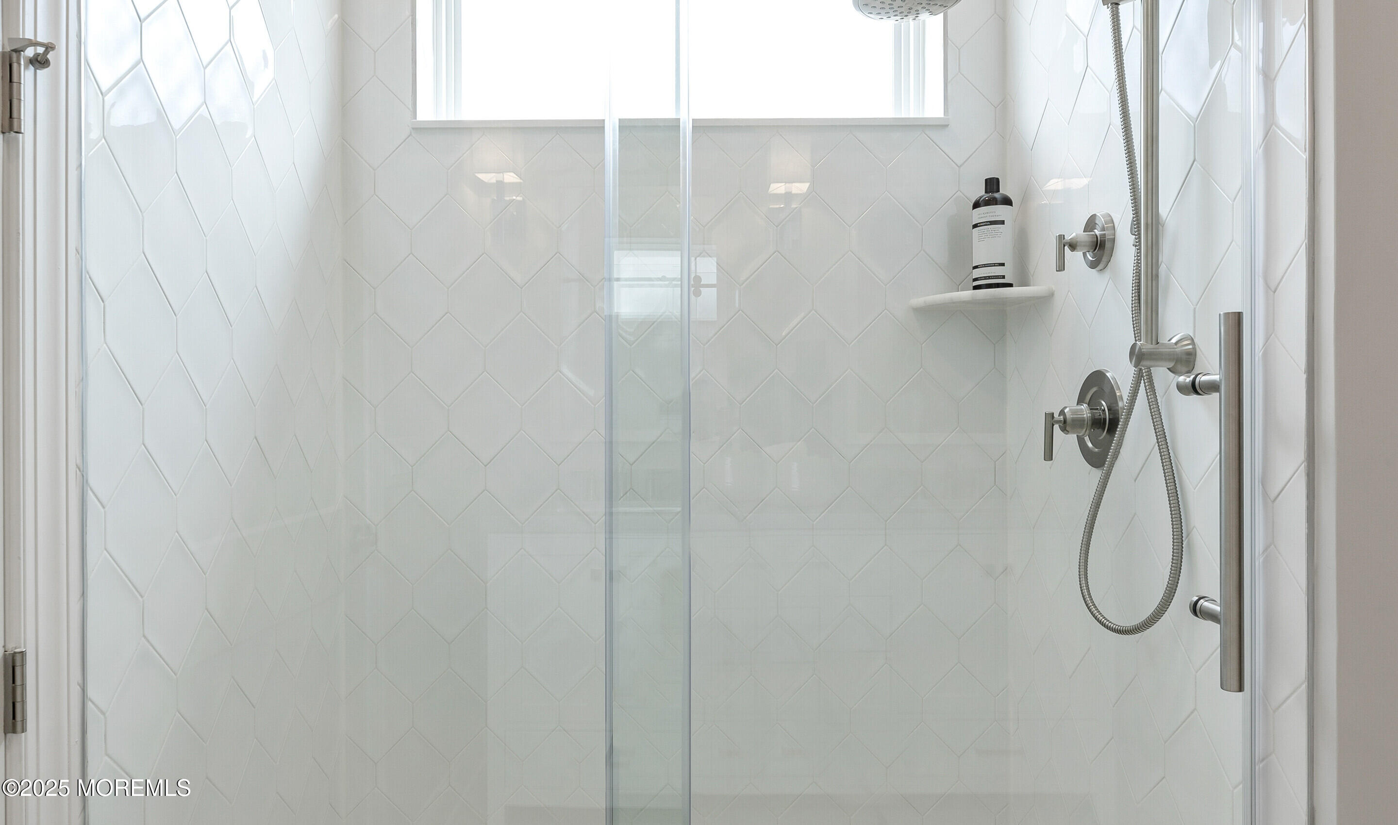 176 Highway 33, Unit KILLARNEY III LOFT Manalapan, NJ 07726 - Photo 18 of 41 a bathroom with a shower