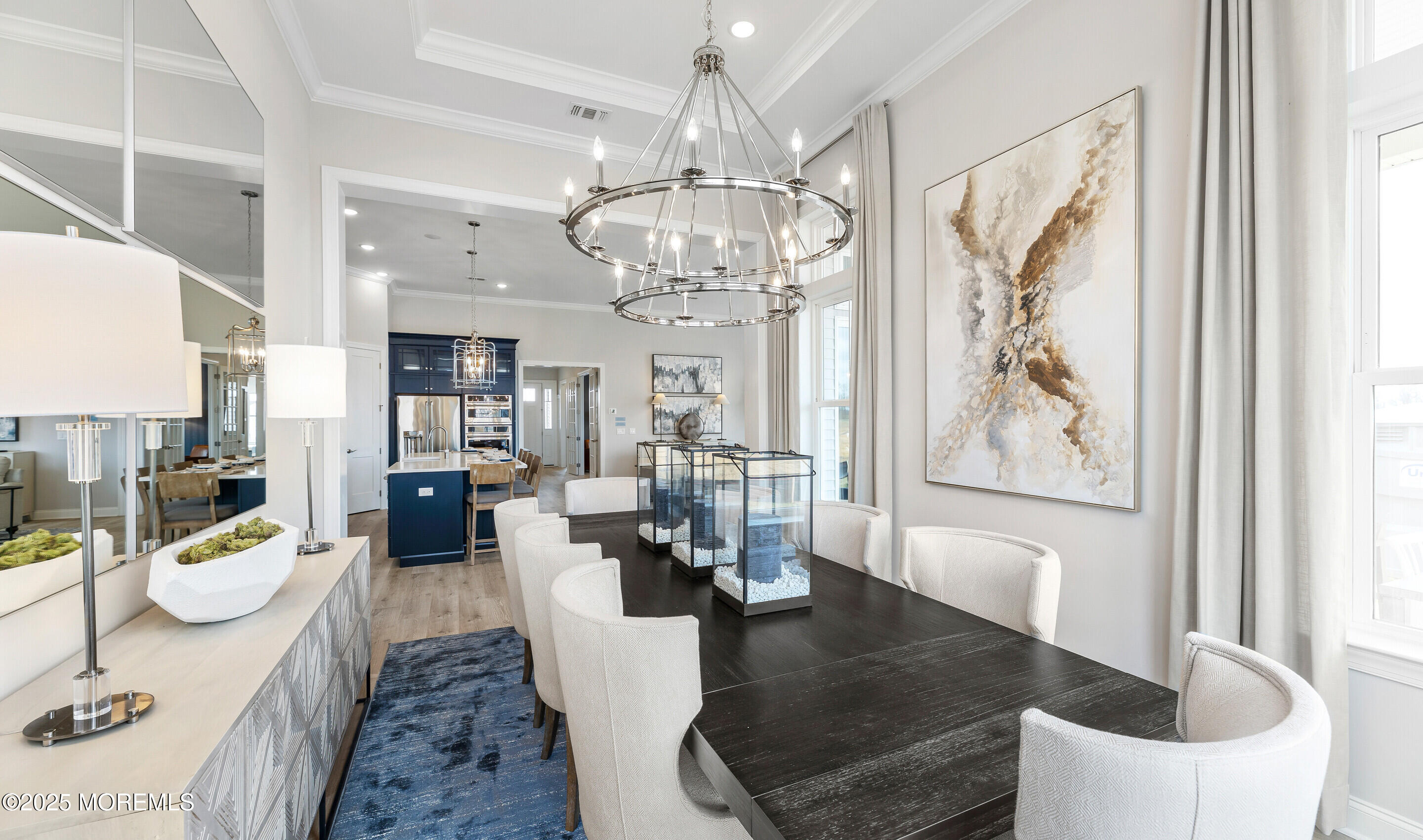 176 Highway 33, Unit KILLARNEY III LOFT Manalapan, NJ 07726 - Photo 2 of 41 a view of a dining room with furniture a chandelier and wooden floor