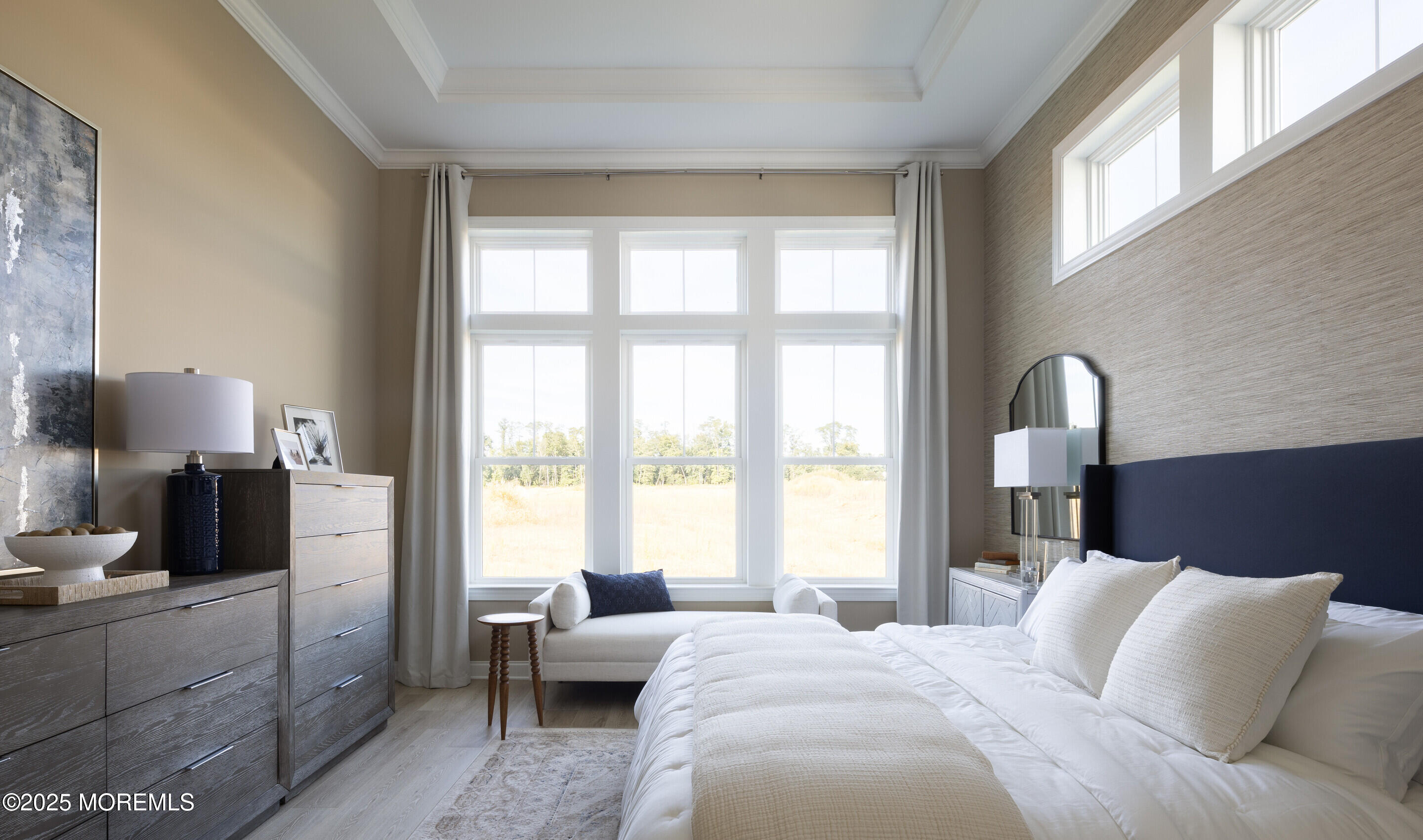 176 Highway 33, Unit KILLARNEY III LOFT Manalapan, NJ 07726 - Photo 38 of 41 a bedroom with a bed and a window