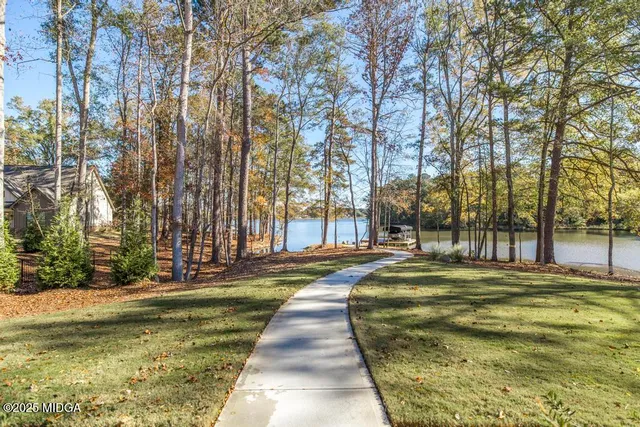 a view of swimming pool with trees