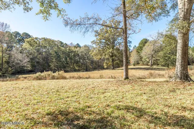 a view of yard covered with snow