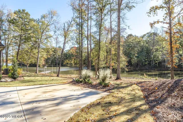 a view of a lake with a house