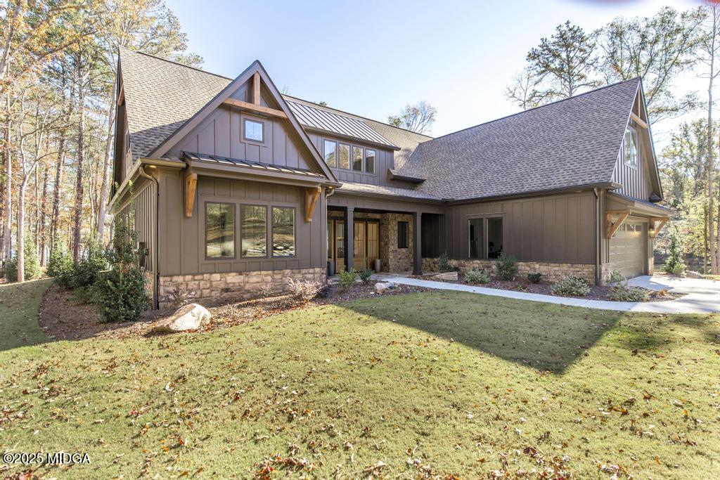 1731 Blue Springs Road Buckhead, GA 30625 - Photo 20 of 50 a front view of a house with garden