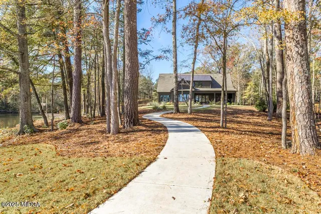 a house with trees in front of it