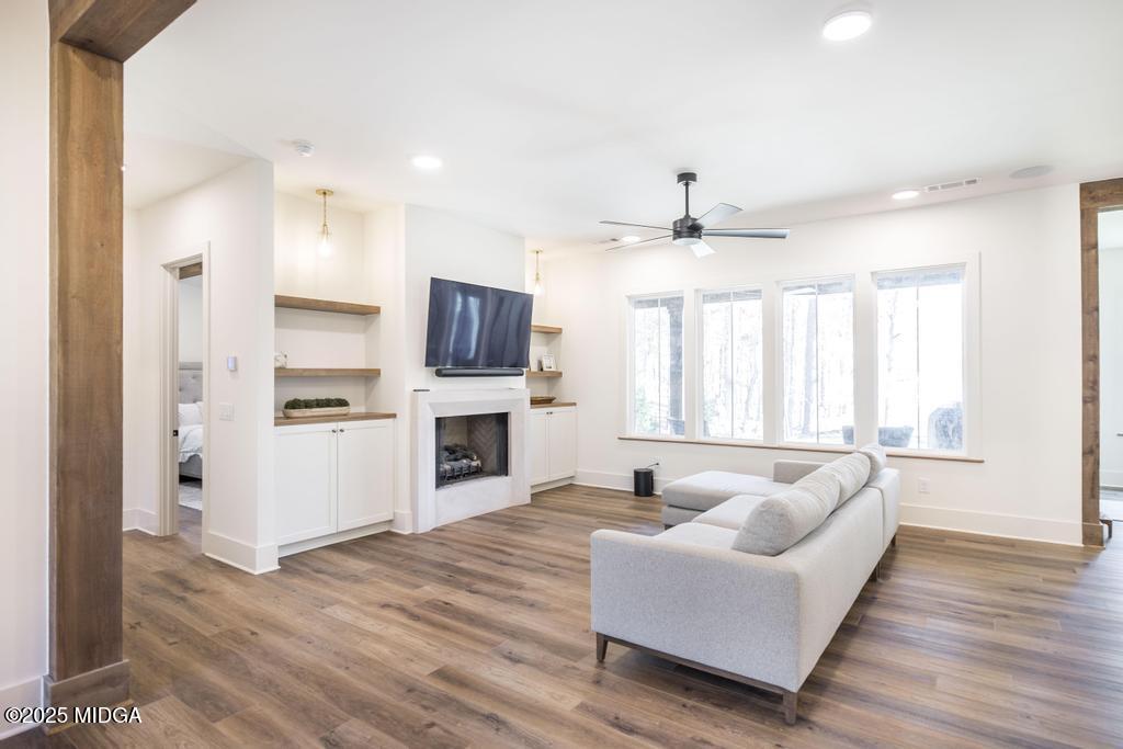1731 Blue Springs Road Buckhead, GA 30625 - Photo 27 of 50 a living room with furniture fireplace and flat screen tv