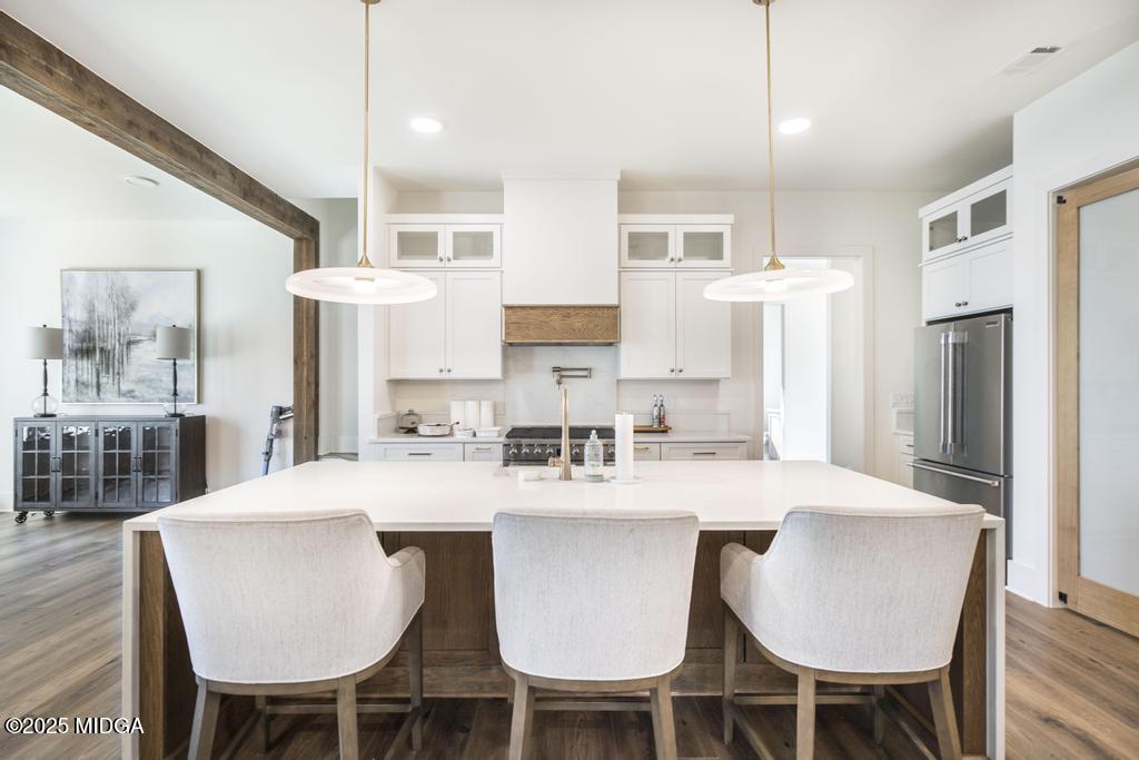 1731 Blue Springs Road Buckhead, GA 30625 - Photo 30 of 50 a dining table with chairs and kitchen view