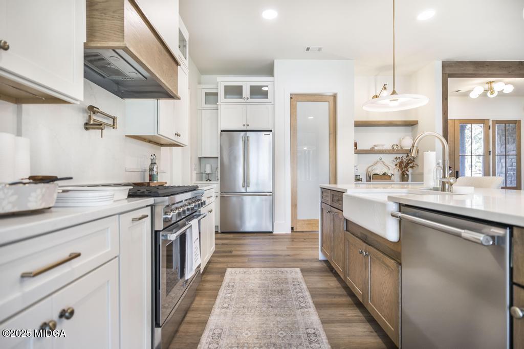 1731 Blue Springs Road Buckhead, GA 30625 - Photo 31 of 50 a kitchen with stainless steel appliances a sink stove and refrigerator
