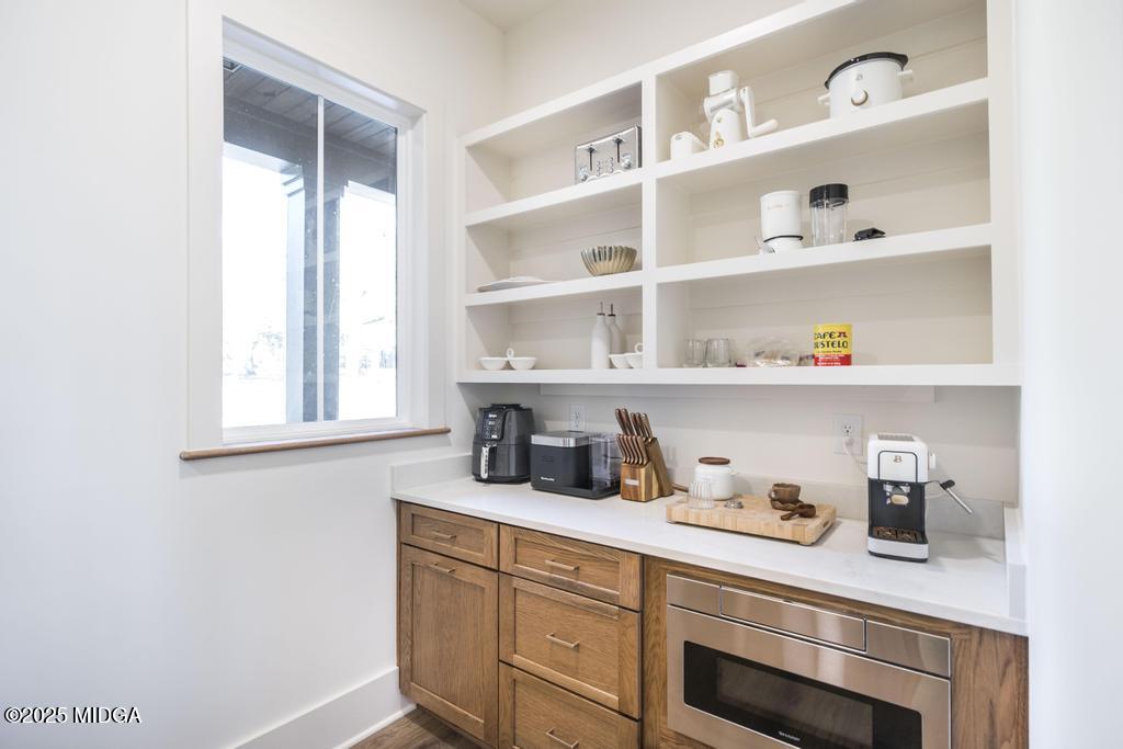 1731 Blue Springs Road Buckhead, GA 30625 - Photo 33 of 50 a kitchen with cabinets and window