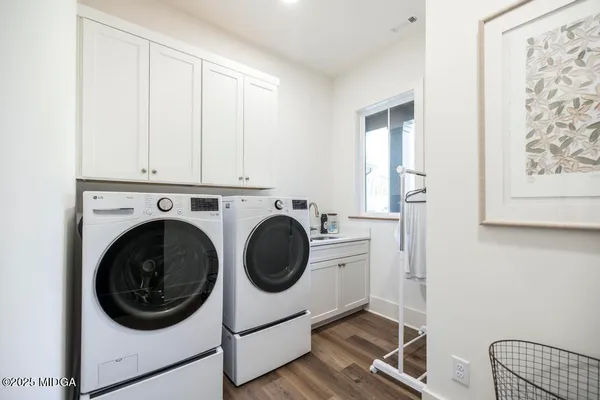 a utility room with dryer and washer