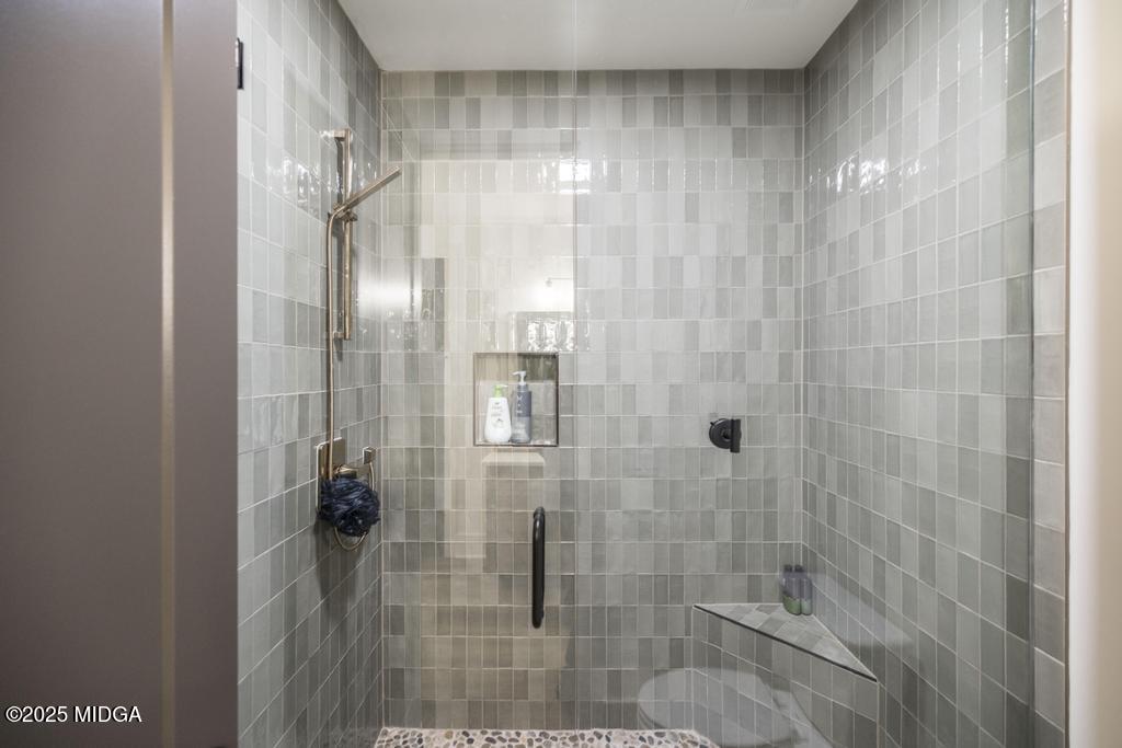 1731 Blue Springs Road Buckhead, GA 30625 - Photo 45 of 50 a bathroom with a glass shower door