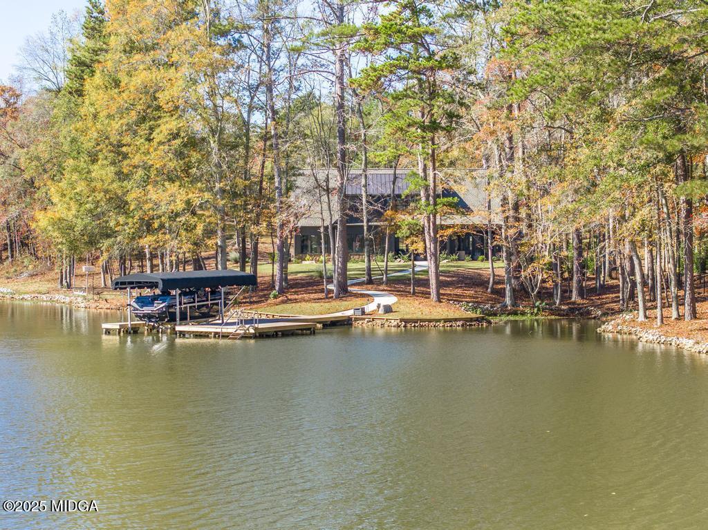 1731 Blue Springs Road Buckhead, GA 30625 - Photo 10 of 50 a view of swimming pool with outdoor seating and lake view