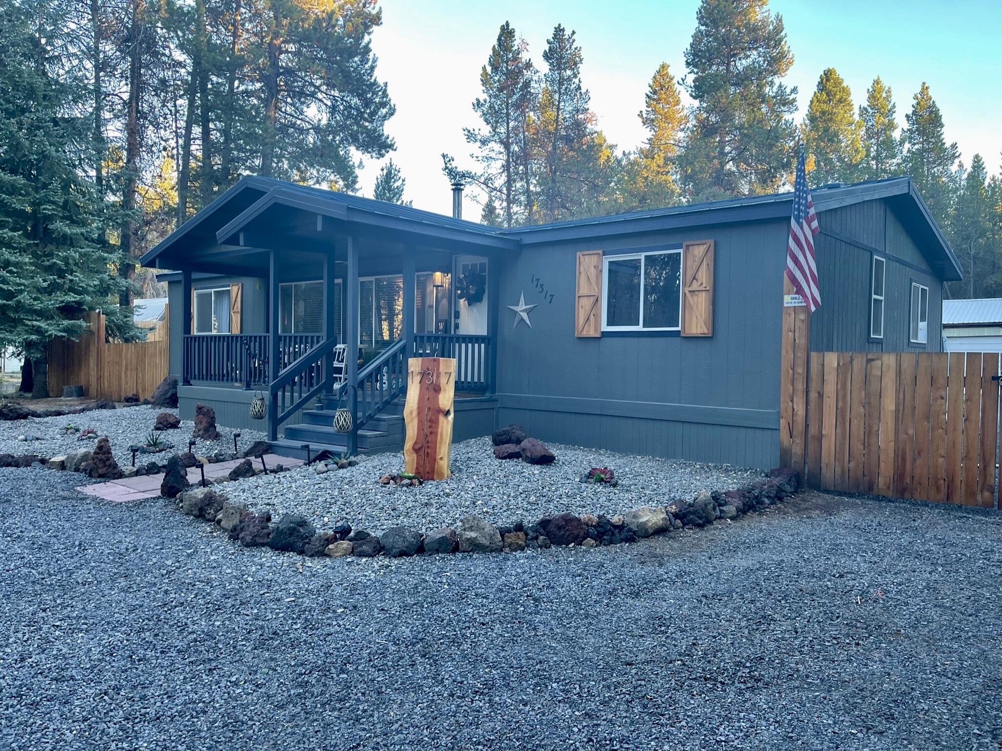 17317 Jacinto Road Bend, OR 97707 - Photo 2 of 25 a front view of a house with garden