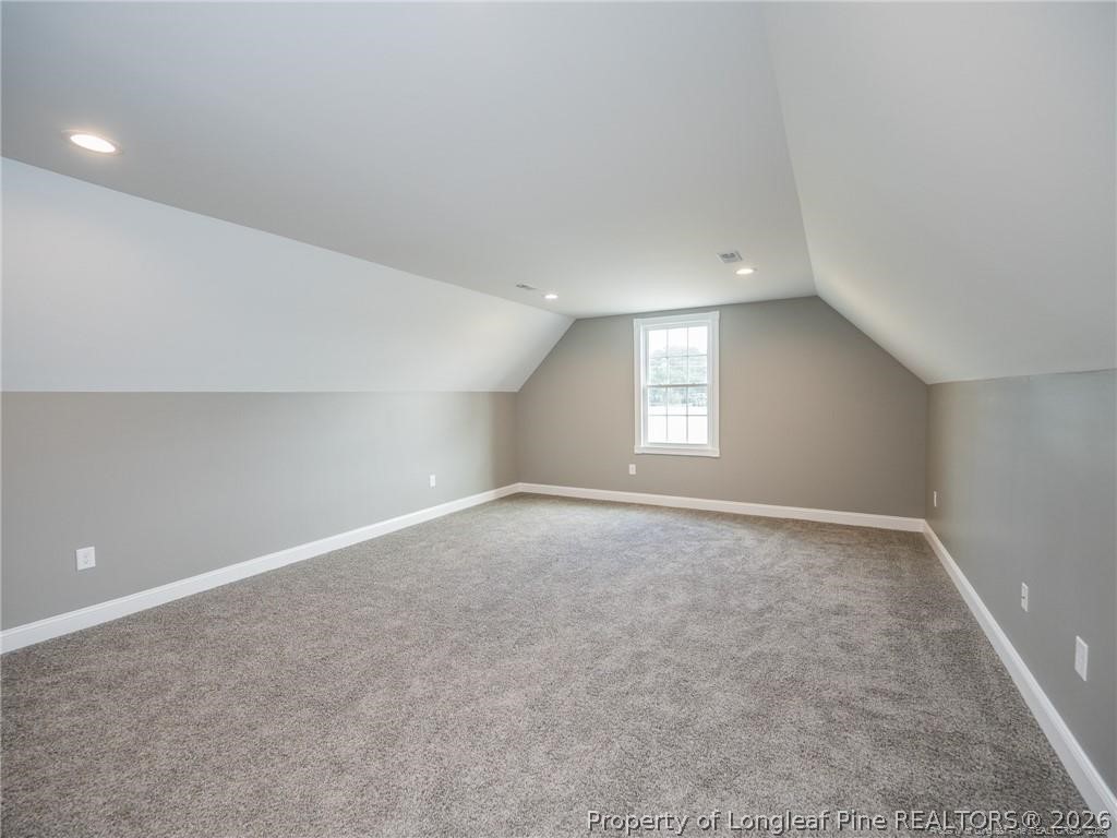 1102 West Carthage Road Lumberton, NC 28360 - Photo 36 of 41 an empty room with windows and closet