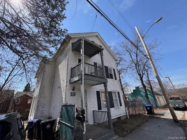 a view of a wooden house with a door