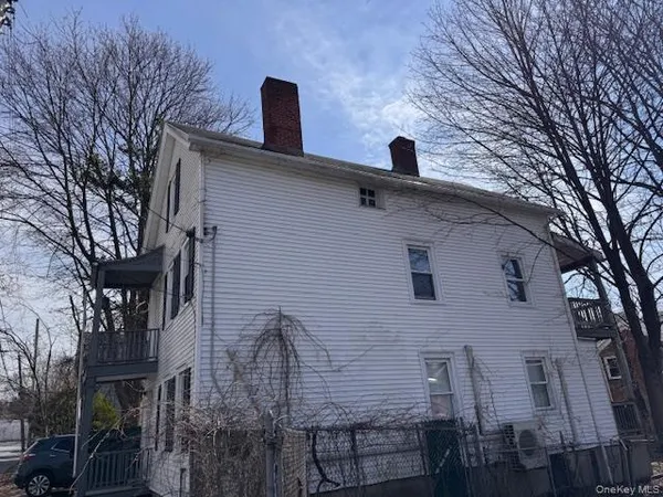 a front view of a house with balcony