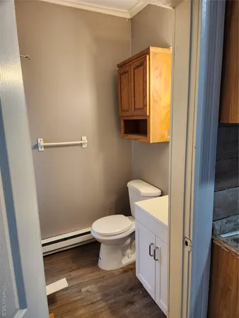 a bathroom with a toilet and a sink