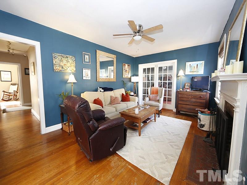 2613 Van Dyke Avenue Raleigh, NC 27607 - Photo 10 of 24 a living room with furniture and a wooden floor